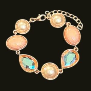 ELEGANT ROSE GOLD BRACELET WITH PEARL, PINK AND BLUE STONES
